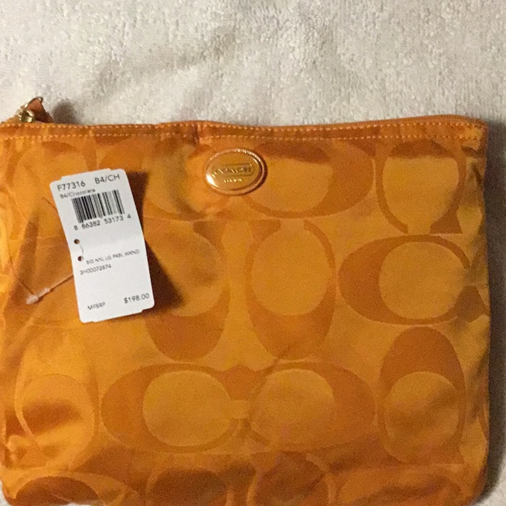 Coach large packable weekend bag set.